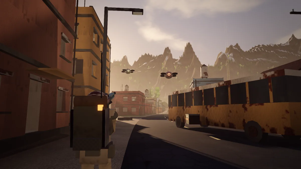 Two Midge drones over a street in Marrowtown, beside a rusted bus.